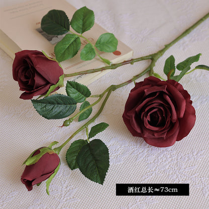 Simulated single-stem three-headed silk rose