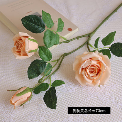 Simulated single-stem three-headed silk rose